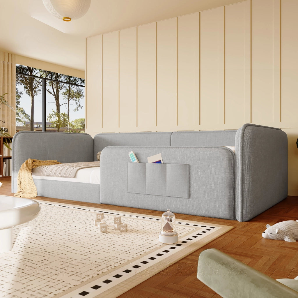 Letto a piattaforma 90x200 cm con rivestimento in lino e tasche laterali; grigio