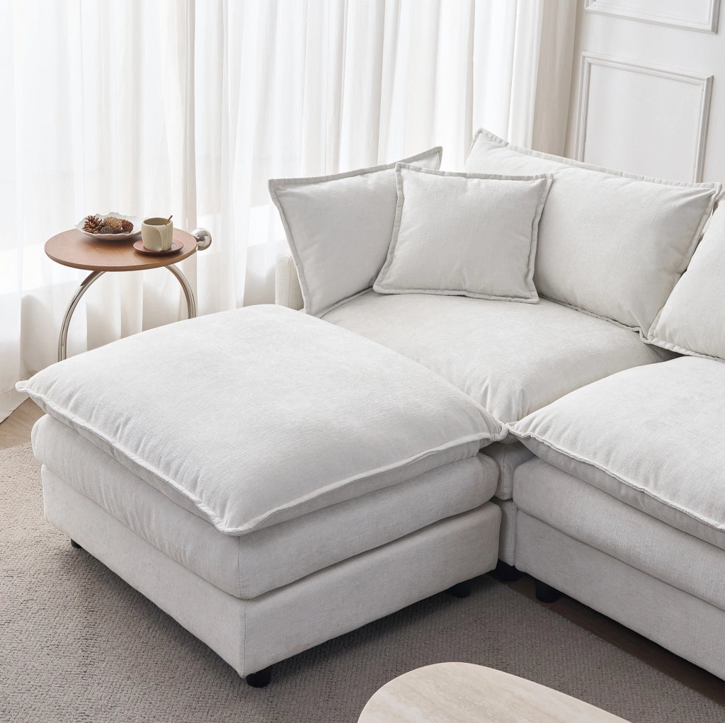 Divano angolare modulare 3 posti in ciniglia beige con pouf HOMVRA