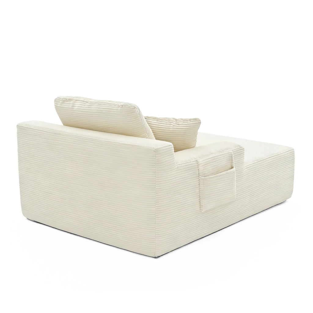 Divano in corduroy beige con tasche laterali e cuscini decorativi, seduta imbottita in schiuma ad alta densità