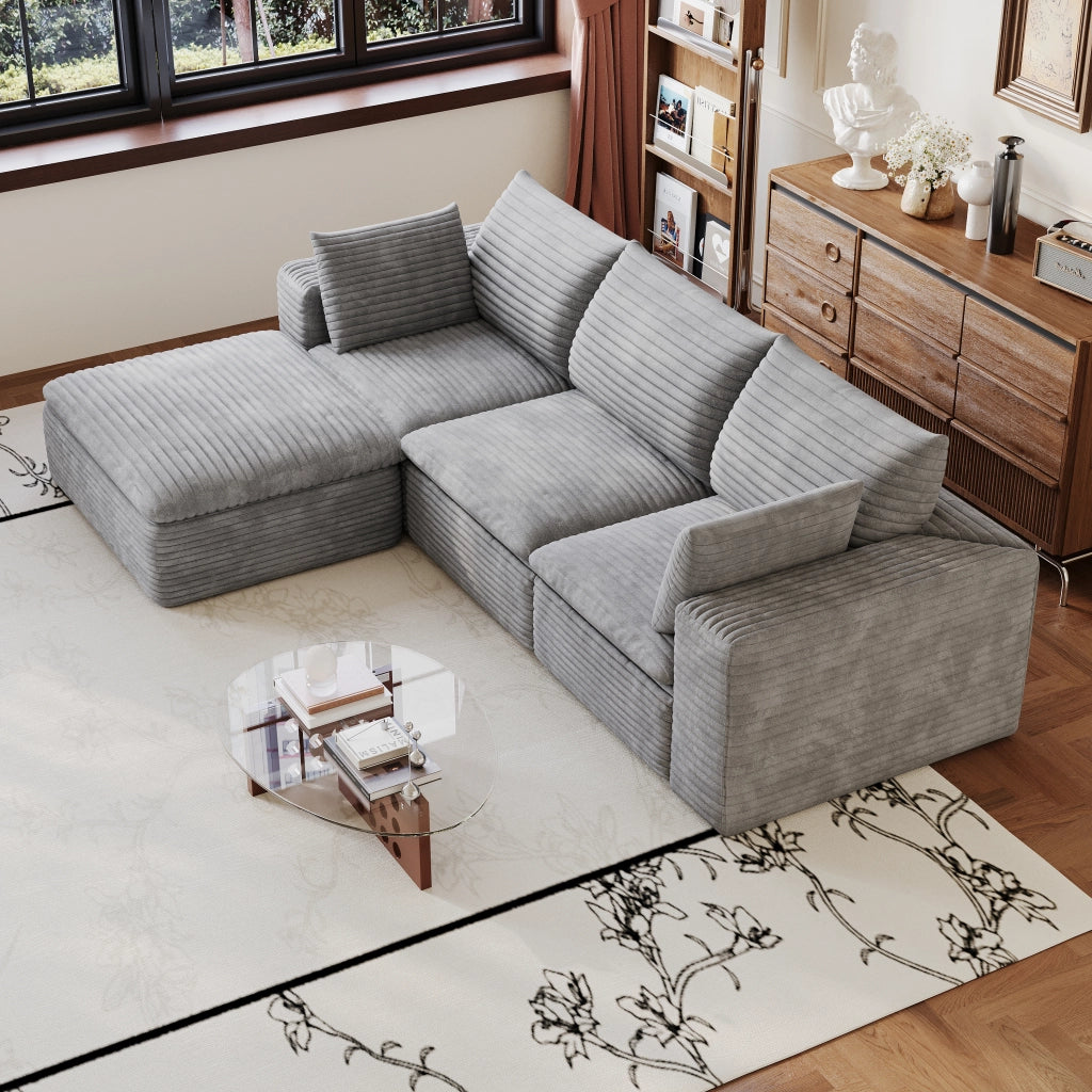 Divano modulare in tessuto grigio con imbottitura in schiuma e design componibile