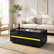 Tavolino da caffè nero con 4 cassetti, piano in vetro temperato e LED