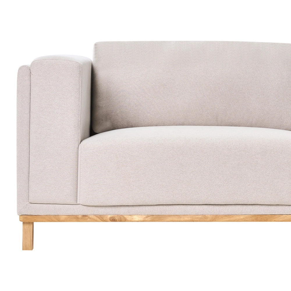 Divano angolare in velluto a coste a 5 posti con braccioli e gambe in legno beige chiaro in stile moderno