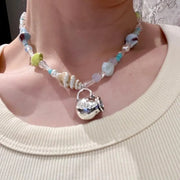 Collana fatta a mano con conchiglie e perline: ciondolo a forma di clavicola in stile spiaggia