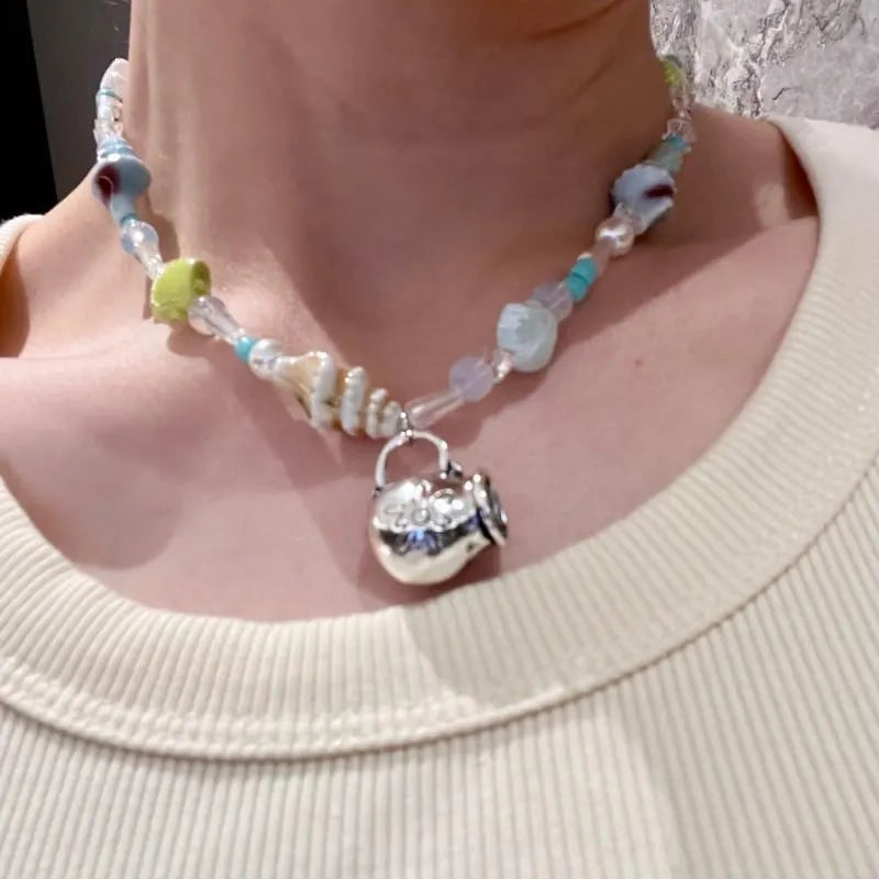 Collana fatta a mano con conchiglie e perline: ciondolo a forma di clavicola in stile spiaggia