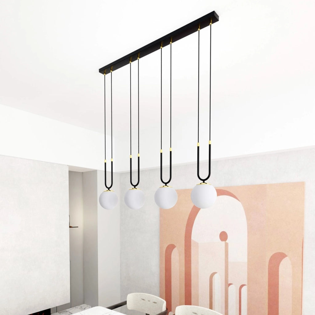Lampada a sospensione GLAM in acciaio nero e oro con sfere in vetro opale