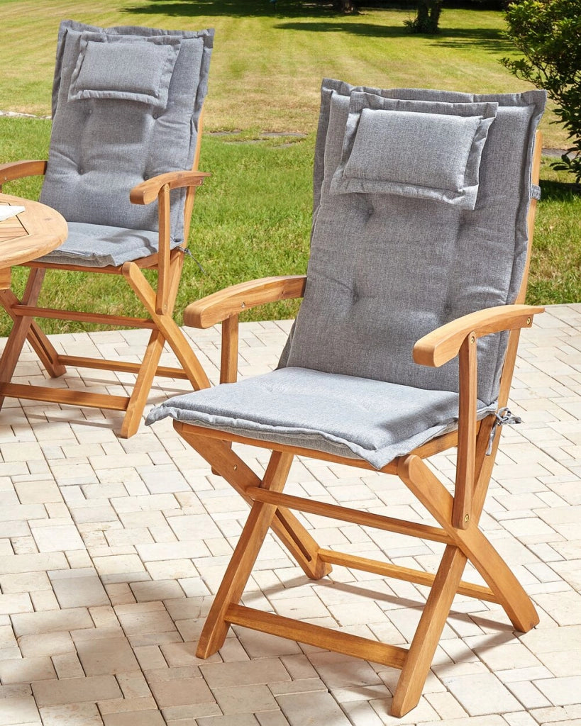 Set di 2 sedie da pranzo da giardino Legno chiaro con cuscino grigio Struttura in legno di acacia Design rustico pieghevole