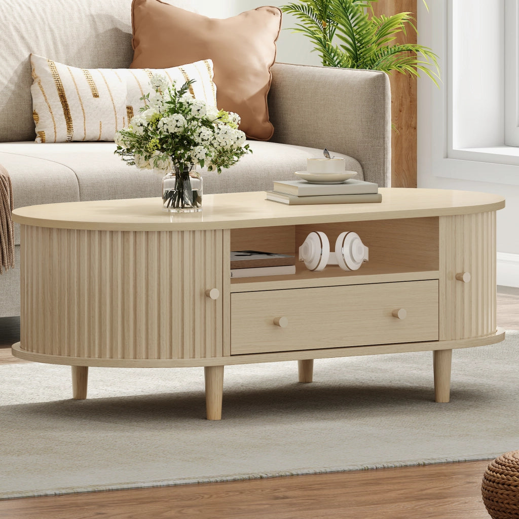 Tavolino basso ovale con 1 cassetto, vani aperti e anta scorrevole, per soggiorno, in MDF, rovere, 100 × 50 × 36 cm