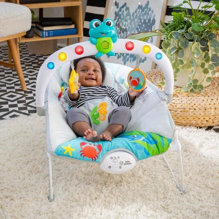 BABY EINSTEIN Sedia a sdraio Neptune - Ocean Explorers, 15 melodie, luci, vibrazioni