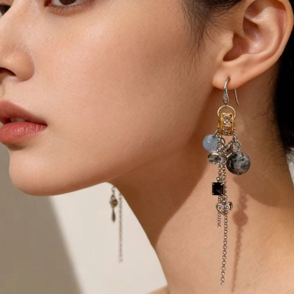 Orecchini vintage con sfera di cristallo blu e nappa