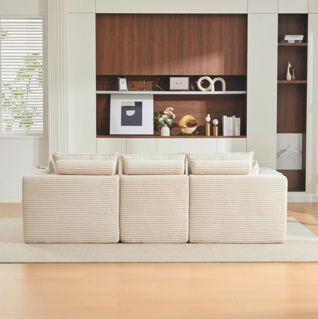 Divano modulare in velluto a coste beige con pouf e tasche laterali HAVRYA