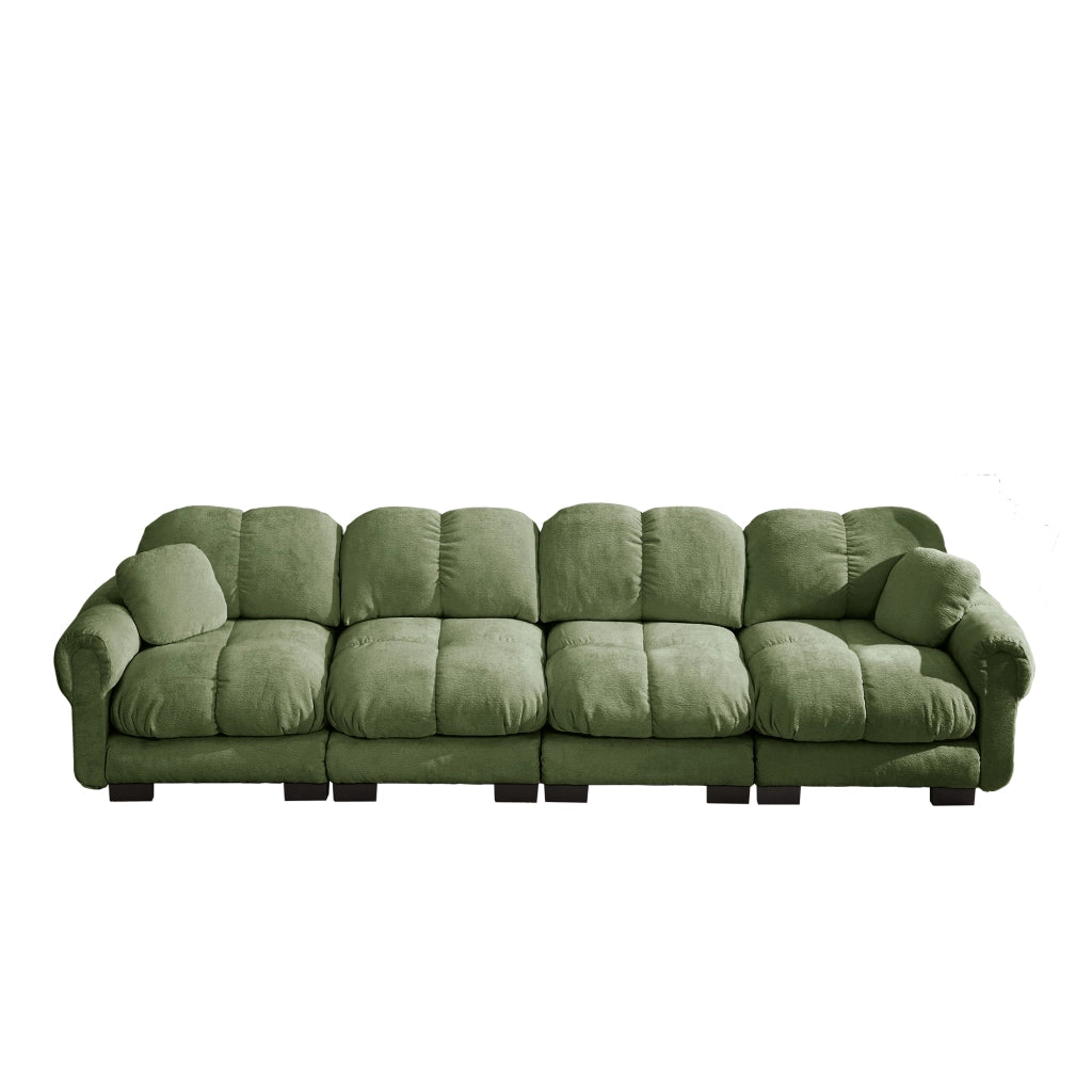 Divano modulare con cuscino lombare; seduta trapuntata e schienale ergonomico in chenille verde
