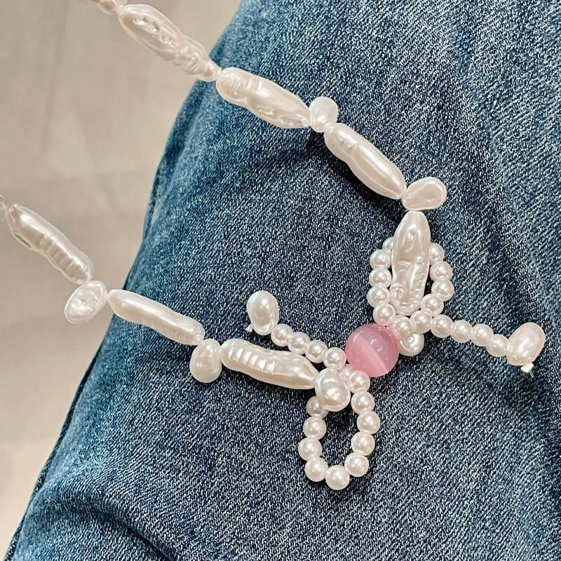 Collana con fiocco di perle rosa fatta a mano, regalo di Natale o di compleanno.