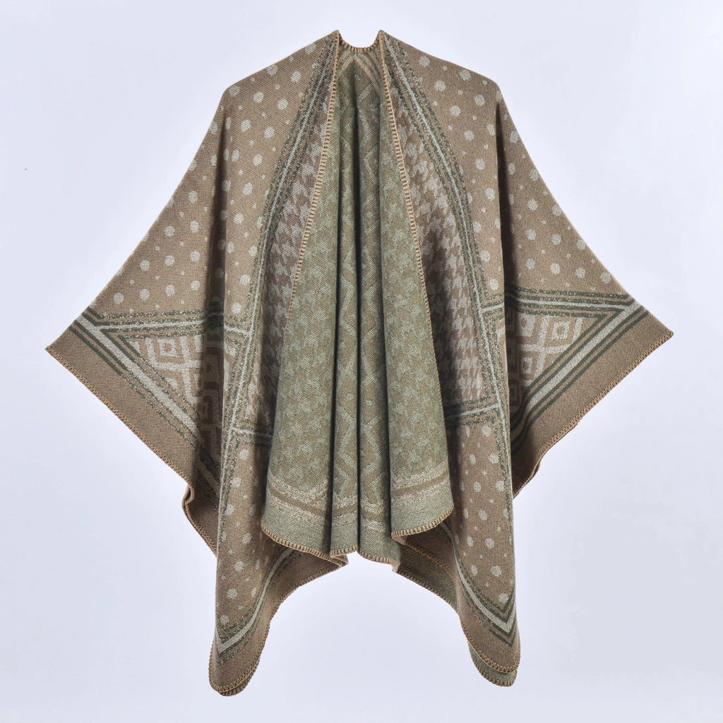 Mantella da donna spessa e calda con spacco, fantasia pied de poule e pois, a blocchi di colore.
