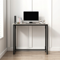 Scrivania compatta 80x40x72 cm, colore marrone, ideale per piccoli spazi.