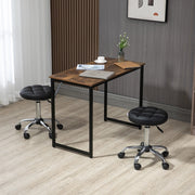 Sgabello girevole regolabile in altezza con ruote per saloni estetici in pelle sintetica nera Ø 35,5 × 48-63 cm