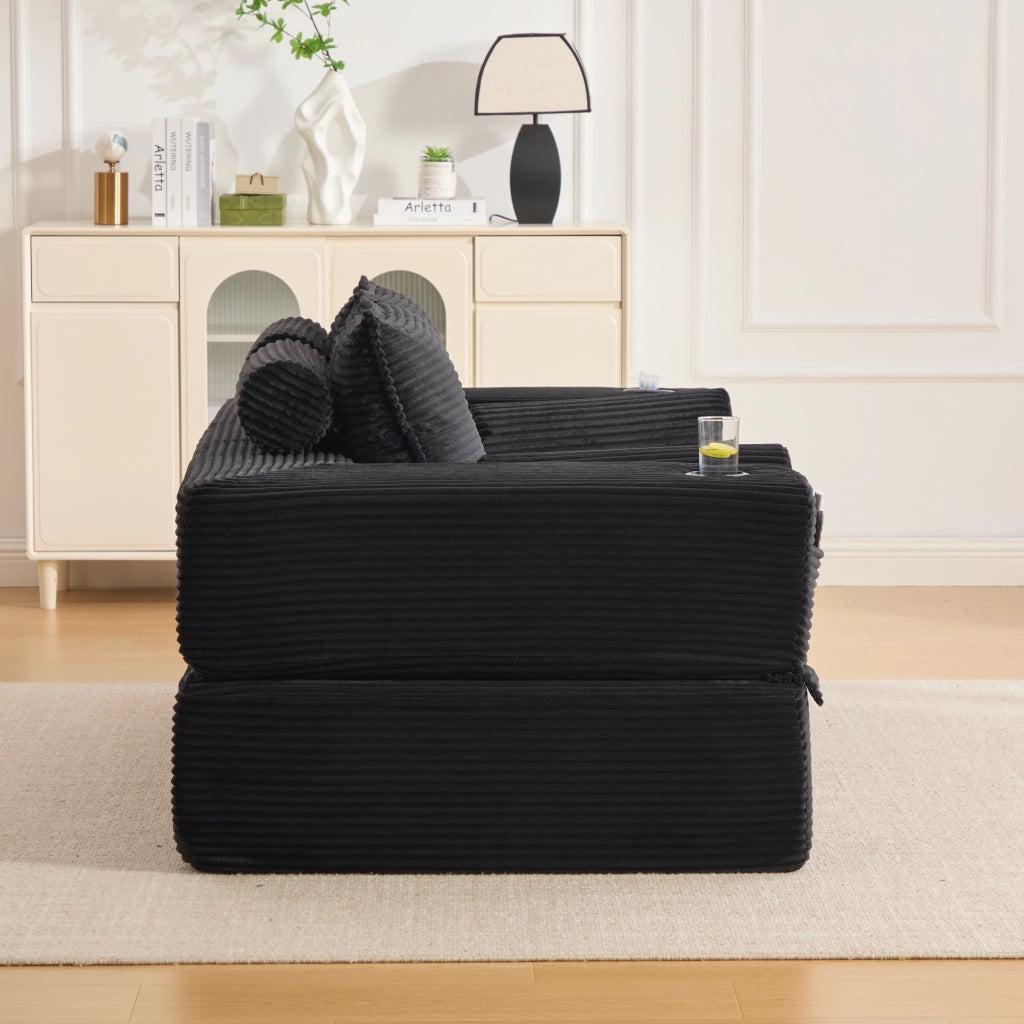 Divano convertibile 2 posti in corduroy con cuscini memory, tasche laterali e portabicchieri nero