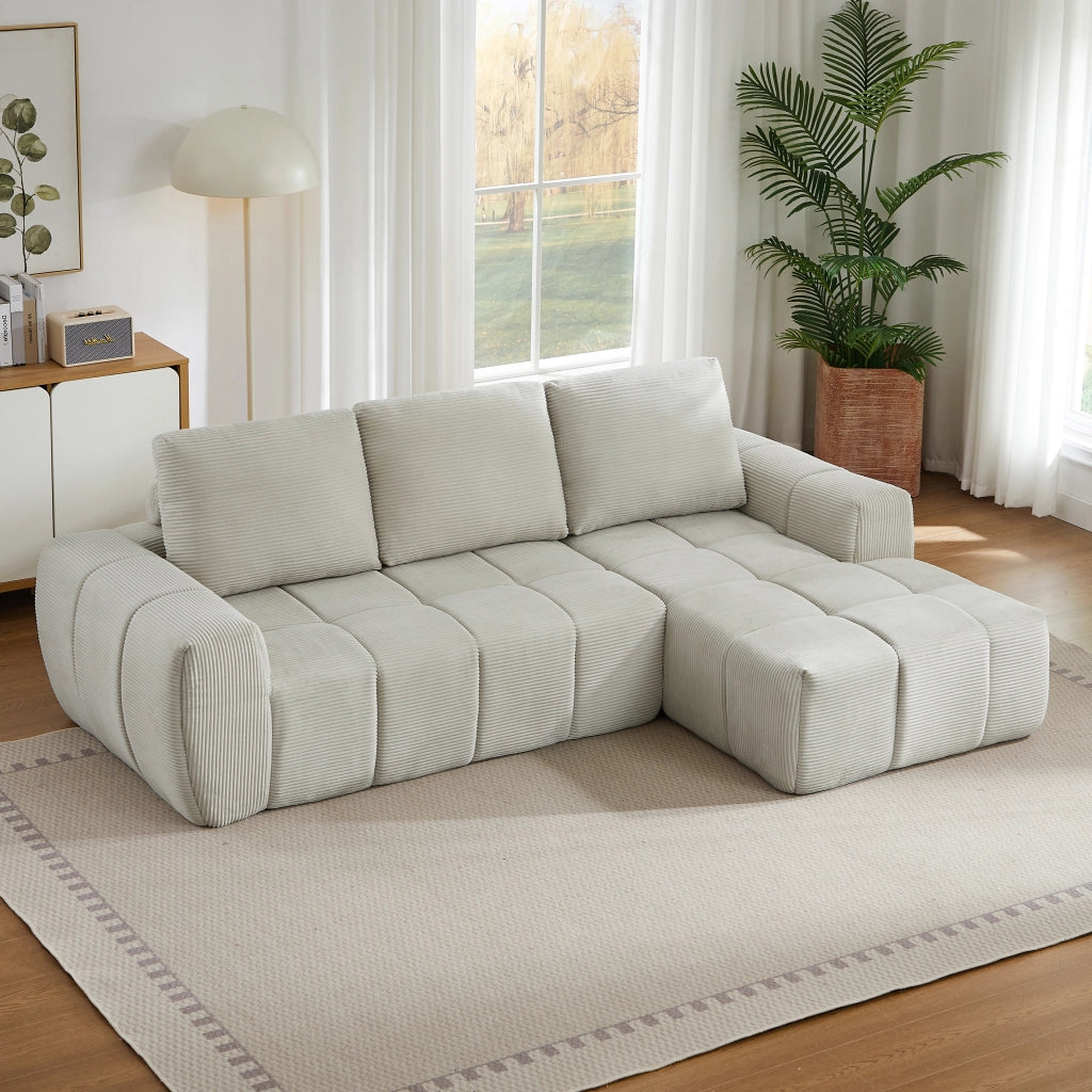 Divano angolare in velluto a coste con design segmentato e cuscini sfoderabili senza montaggio per soggiorno beige