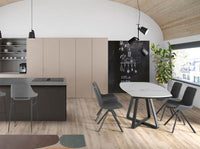 Tavolo da pranzo allungabile barile ovale marmo porcellanato e acciaio nero