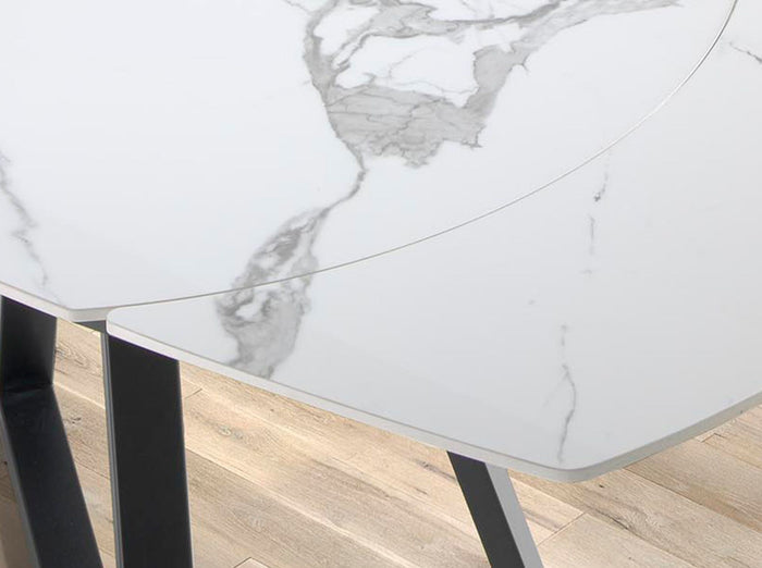 Tavolo da pranzo allungabile barile ovale marmo porcellanato e acciaio nero