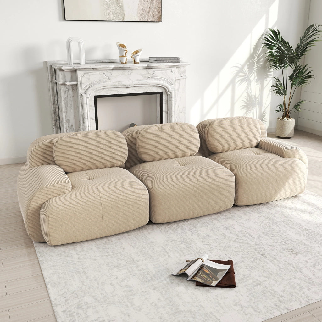 divano angolare modulare 3 posti senza struttura con base antiscivolo e braccioli curvi in velluto a coste beige