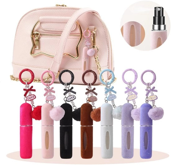 Set di 7 taschini in piuma, flaconi profumati vuoti, sospensioni per chiavi femminili, flaconcini profumati da 5 ml e cariche ricaricabili portatili.