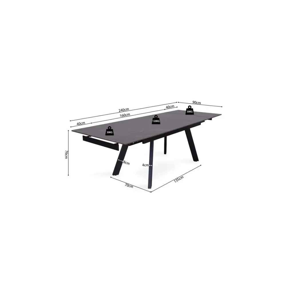 Tavolo da pranzo estensibile per 10 persone con piano in pietra nera della collezione LAROS. Struttura in metallo.