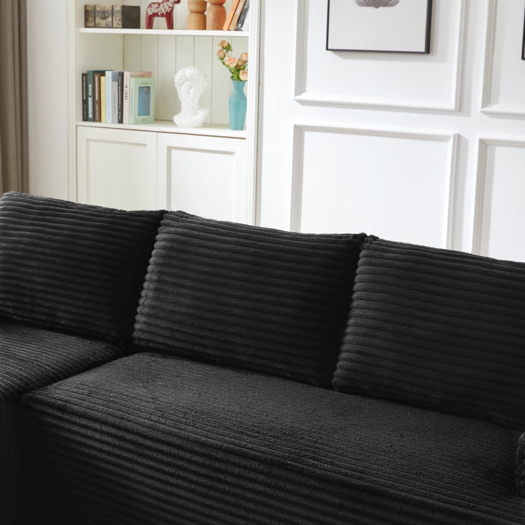 Divano con schiuma e molle insacchettate in corduroy nero
