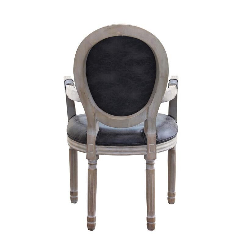 POLTRONA CONSTANCE IN ECOPELLE NERA DAL DESIGN VINTAGE