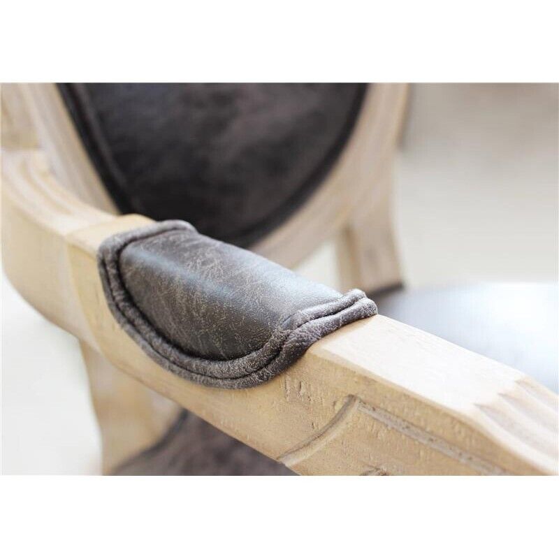 POLTRONA CONSTANCE IN ECOPELLE NERA DAL DESIGN VINTAGE