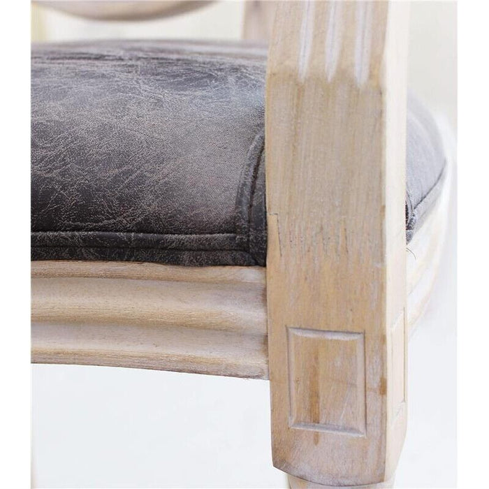 POLTRONA CONSTANCE IN ECOPELLE NERA DAL DESIGN VINTAGE