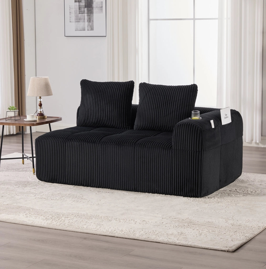Divano a 2 posti in tessuto corduroy nero con tasche laterali e portabicchieri; 158 x 93 x 61 cm