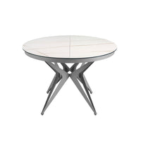 Tavolo da pranzo rotondo allungabile in marmo porcellanato e acciaio grigio