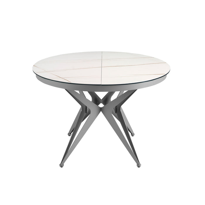 Tavolo da pranzo rotondo allungabile in marmo porcellanato e acciaio grigio