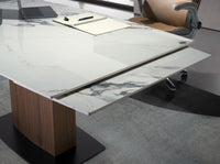 Tavolo da pranzo allungabile barile ovale marmo porcellanato e noce