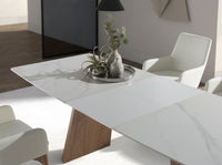 Tavolo da pranzo allungabile barile ovale marmo porcellanato e noce