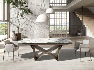 Tavolo da pranzo allungabile ovale a botte in marmo porcellanato e acciaio metallizzato taupe
