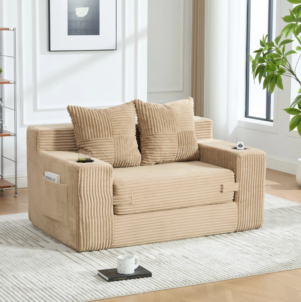Divano pouf in velluto a coste kaki con tasche laterali e 2 cuscini; 151 x 133 x 64 cm