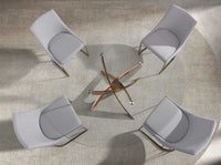 Tavolo da pranzo rotondo in vetro temperato e acciaio rosa