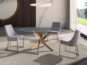 Tavolo da pranzo rotondo in vetro temperato e acciaio rosa