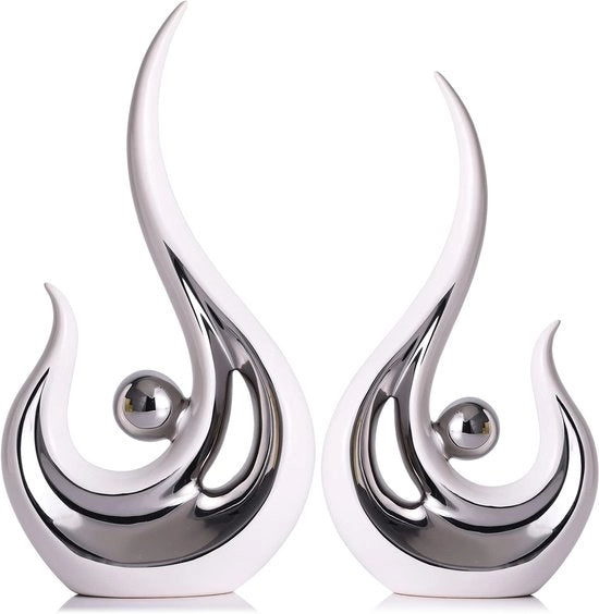 Arredamento moderno, accessori di design, decorazioni per tavolo, sculture ceramiche e gioielli d'argento per la camera da pranzo e il salotto