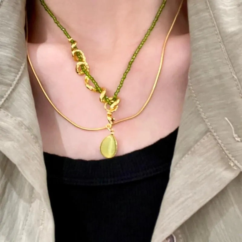 Collana a serpente fatta a mano con perline di cristallo verde, regalo di Natale o di compleanno.