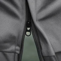 Poltrona Moderna con Poggiapiedi e 2 Tasche Laterali, in Tessuto Effetto Velluto e Acciaio, 80x78x100 cm, Grigio