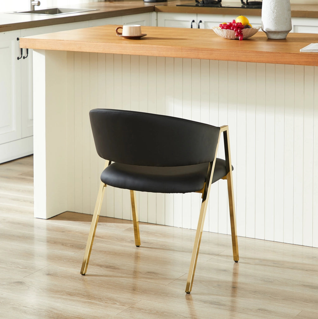 Sedia da pranzo nera con struttura in metallo color oro