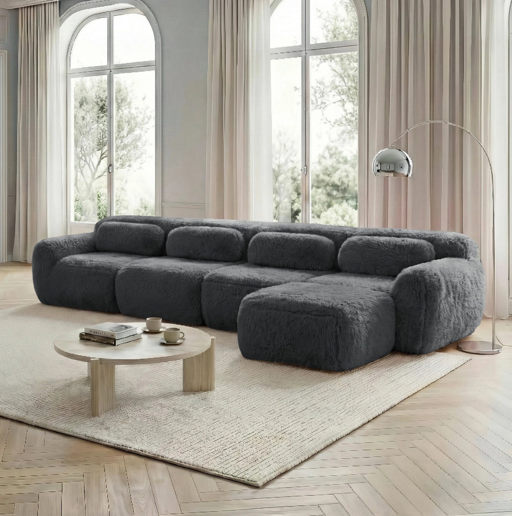 Divano angolare modulare 4 posti in tessuto plush grigio HOMVRA