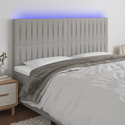 Testiera a LED-Testata con LED Grigio Chiaro 160x5x118/128 cm in Tessuto 391532