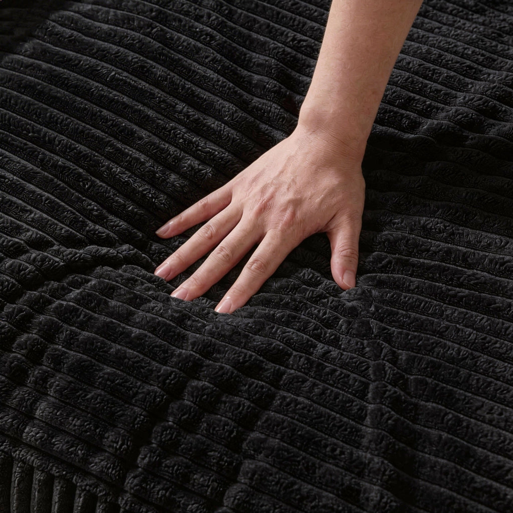 Divano modulare angolare con chaise longue reversibile; velluto a coste nero