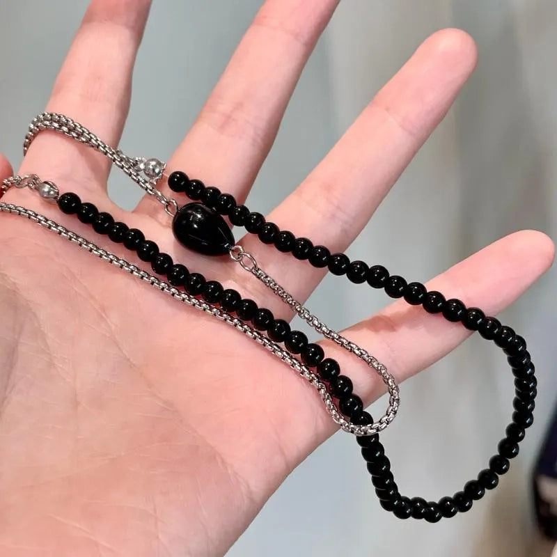 Collana patchwork di perle nere fatta a mano, regalo di Natale o di compleanno.