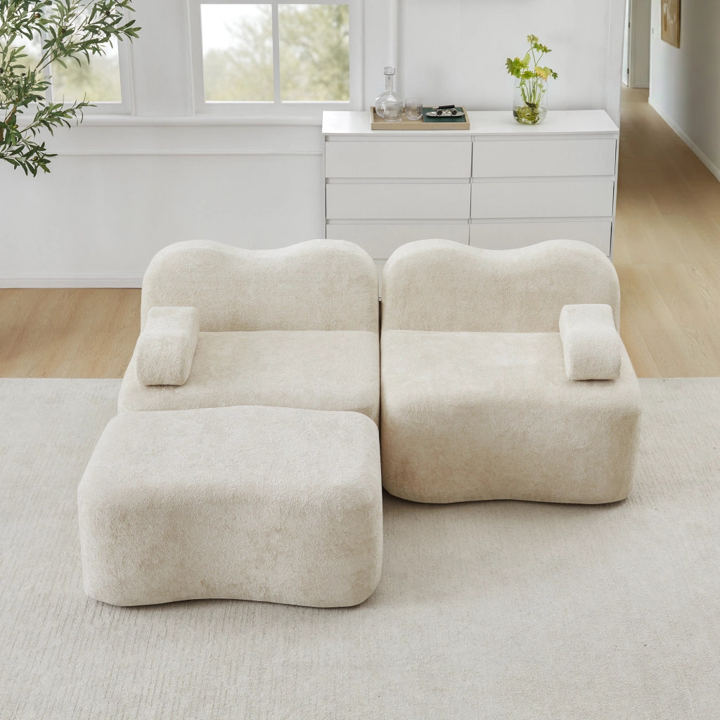 Divano angolare modulare senza struttura con ottomano e braccioli mobili in velluto beige per soggiorno e appartamento