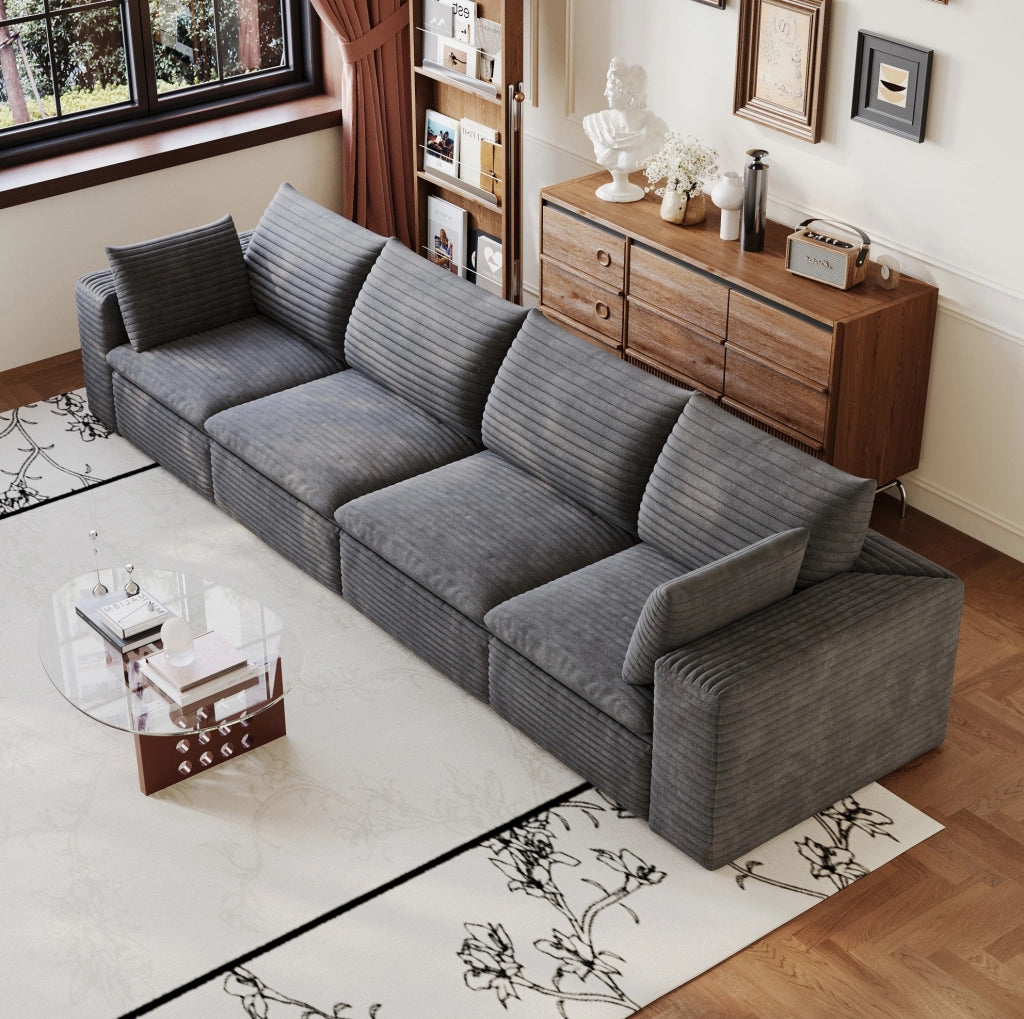 Divano modulare in tessuto grigio scuro con supporto in schiuma; design componibile