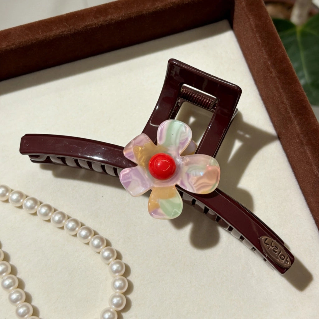 Fermaglio a forma di squalo con fiore iridescente Ankola Red Claw da donna